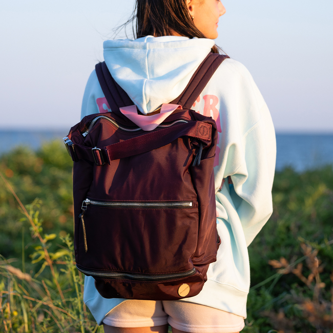 1080x1080 boxer burgundy on back at beach copy.jpg