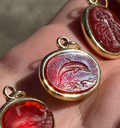 Vintage yellow 18K carved carnelian aquatic animal pebble pendants