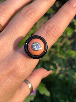 Vintage yellow 18K and platinum target ring with onyx, coral, and approx .8 ctw old European cut dia