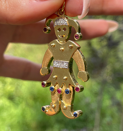Vintage yellow 18K articulated Jester pendant with rubies, sapphires and diamonds