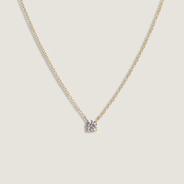 5x7_low_res_14k_solid_gold_ecom_flat_MD_SolitaireFloatingRoundDiamondNecklace_large_5618977c-84fe-4adc-b672-f88f391efac8.webp