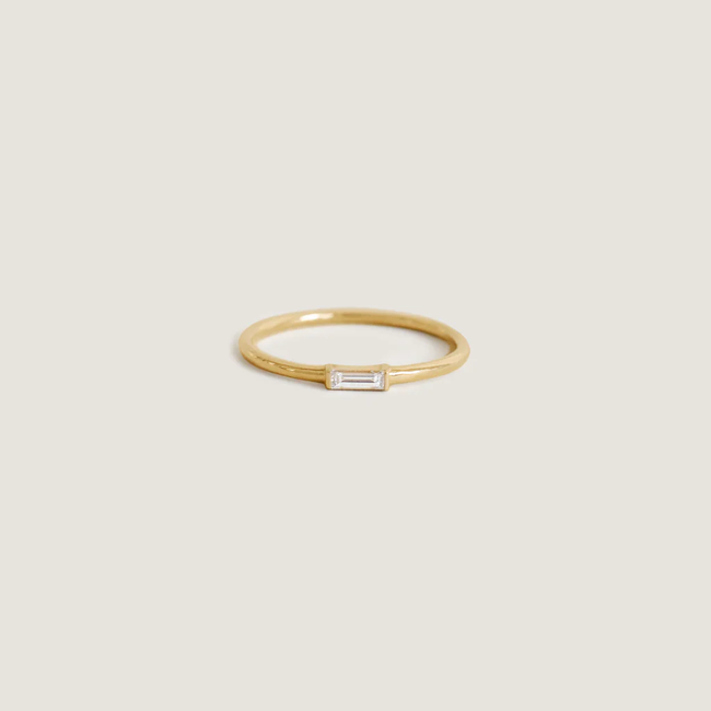 5x7_low_res_14k_solid_gold_ecom_flat_MD_solitairebaguette__diamond_ring.webp