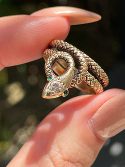 Vintage yellow 14K textured snake ring with .1 ctw diamond and emerald eyes, size 6