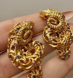 Vintage circa 1960s yellow 18K approx .6ctw sapphire and ruby ram clip statement earrings