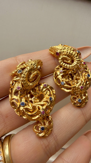Vintage circa 1960s yellow 18K approx .6ctw sapphire and ruby ram clip statement earrings