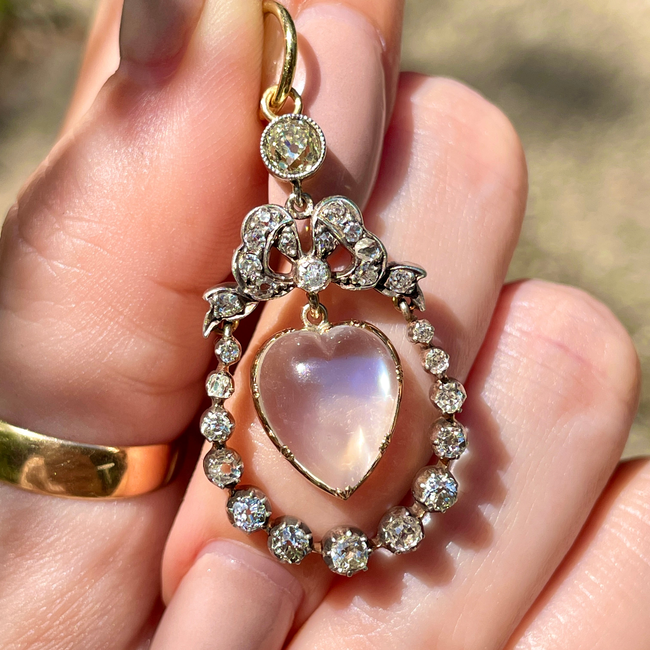 Incredible Antique 18K and 14K approx 1.22 ctw diamond and heart shaped moonstone bow pendant-gallery-54345330721083