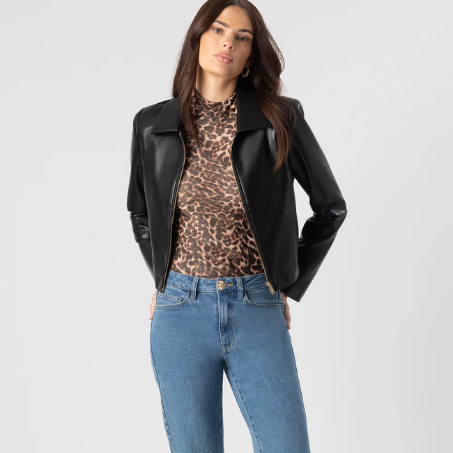 F25_LolaVeganLeatherJacket_Black_MiloMeshBodysuit_Leopardess_RylandDenimPants_StarLightBlue_3.webp