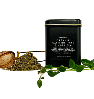 Organic caffeine-free ginger tea with tongs