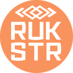 RUKSTR-logo-WHT-ORNG-Circle-320x320-Insta.png