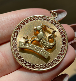 Vintage yellow 14K gold Capricorn statement pendant