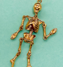 Vintage yellow 14K gold large articulated skeleton pendant