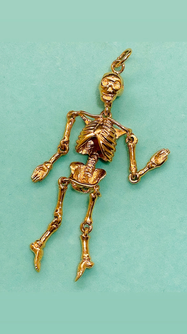 Vintage yellow 14K gold large articulated skeleton pendant