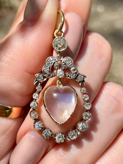 Incredible Antique 18K and 14K approx 1.22 ctw diamond and heart shaped moonstone bow pendant