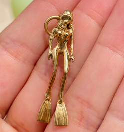 Vintage yellow 14K female scuba diver pendant