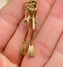 Vintage yellow 14K female scuba diver pendant