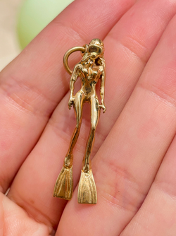 Vintage yellow 14K female scuba diver pendant