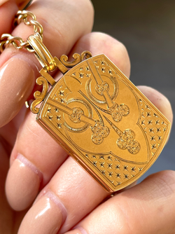 Antique warm yellow 18K engraved celestial shield locket pendant