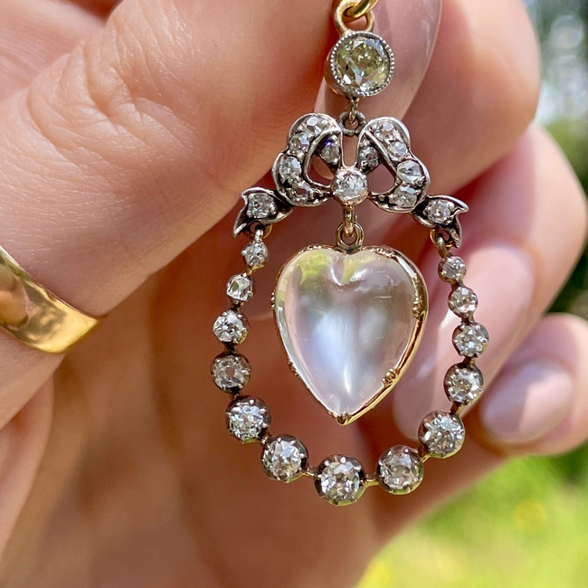 Incredible Antique 18K and 14K approx 1.22 ctw diamond and heart shaped moonstone bow pendant-gallery-54345330557243
