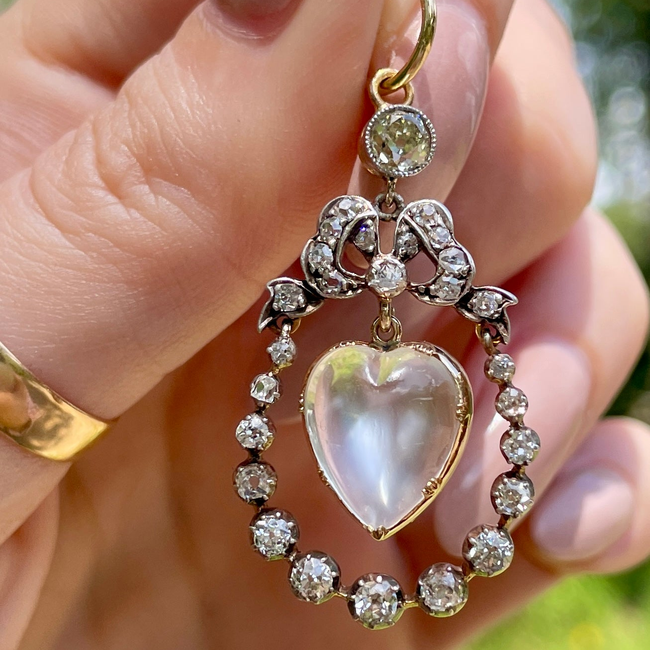 Incredible Antique 18K and 14K approx 1.22 ctw diamond and heart shaped moonstone bow pendant-gallery-54345330557243