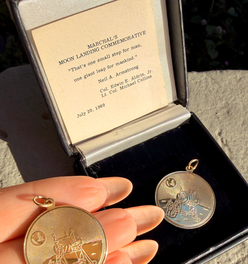 Vintage yellow 14K commemorative Moon Landing pendants with box from 1969