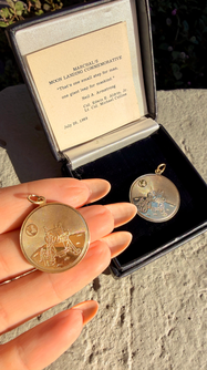 Vintage yellow 14K commemorative Moon Landing pendants with box from 1969