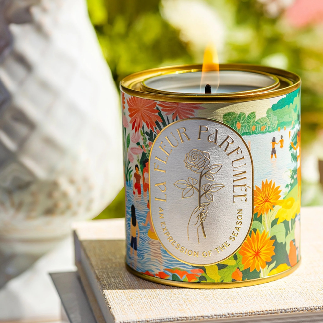 imageye___-_La-Fleur-Candier-File_Name_hamoa-beach-candle-on-book-with-best-summer-scents.jpg
