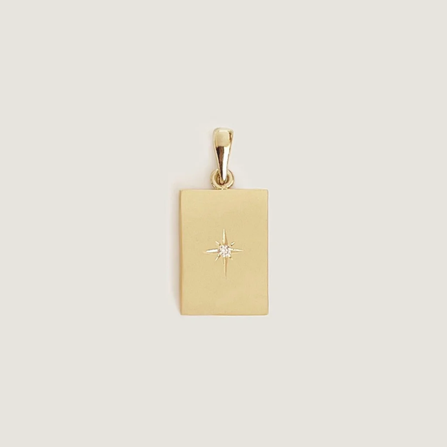 kinn_14k_gold_fine_jewelry_north_star_pendant_1_b6a93fb7-c4b4-467a-adda-fc7cd211f55f.webp
