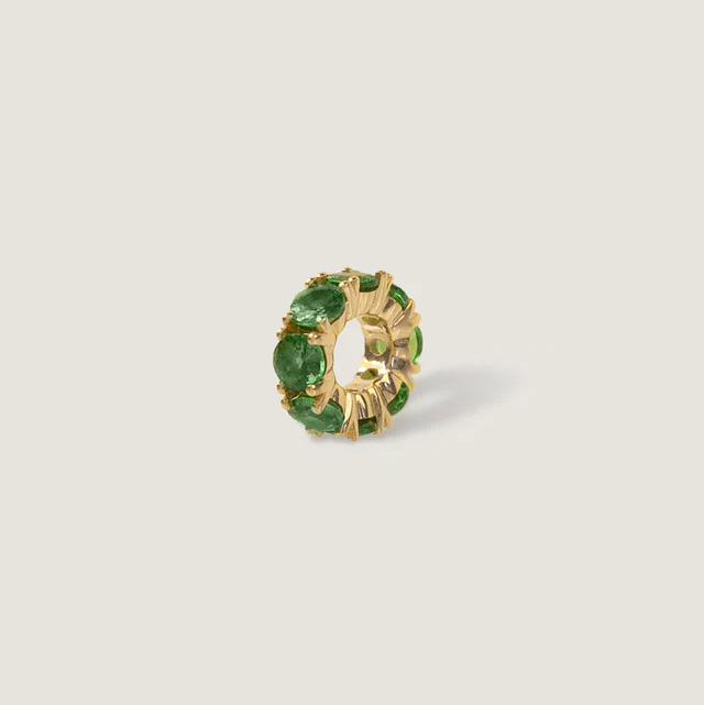 kinn_14k_gold_fine_jewerly_milestone_pave_flatlay_2kinn_14k_gold_fine_jewerly_milestone_charms_green_tsavorite_flatlay.webp