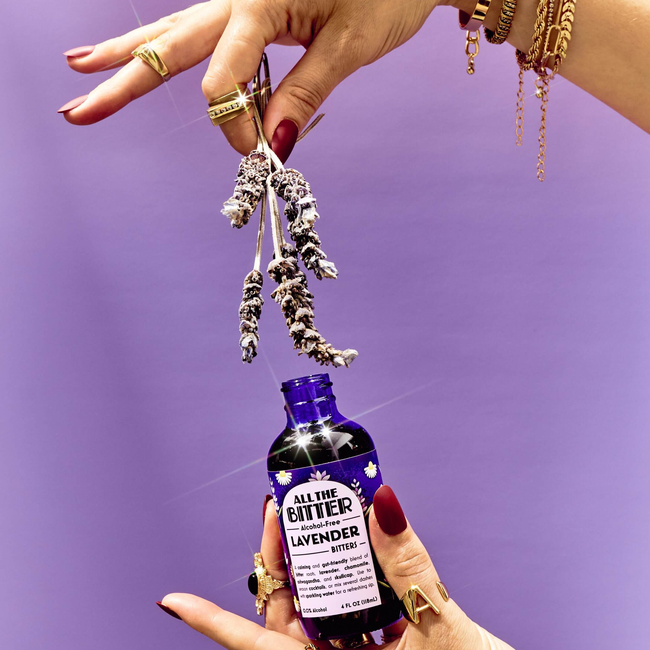 lavender bitters hand shot full.jpg